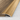 Close up of wood effect aluminium door threshold profile showing grain and finish for flooring transitions